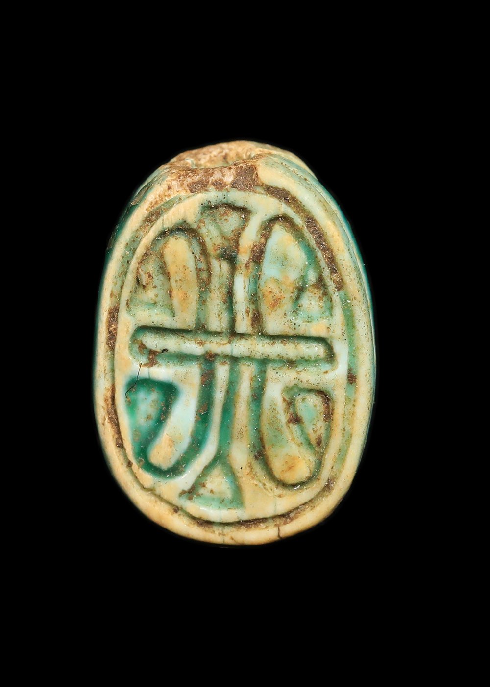 Blue faience scarab with papyrus motif